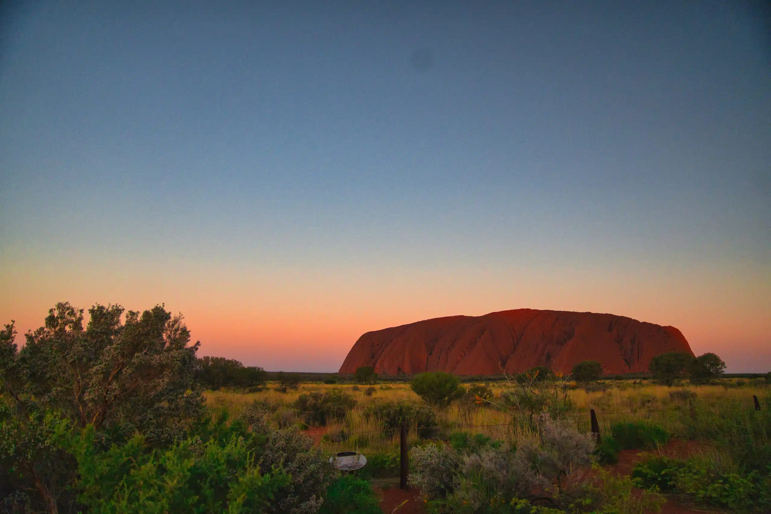 A view of Uluru at sunset